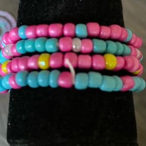 Bundle of four, turquoise and pink themed.